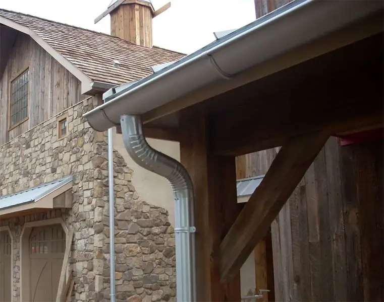 Galvanized gutters on traditional home - Need: 600x500px image of galvanized gutters on classic/traditional style home